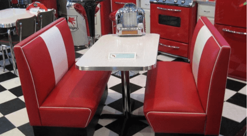 1950s-style table set from Bars & Booths home improvement store in a retro living space